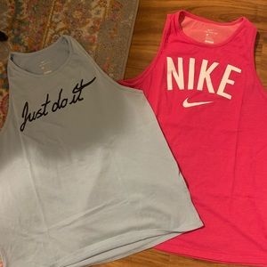 Two size M Nike tee